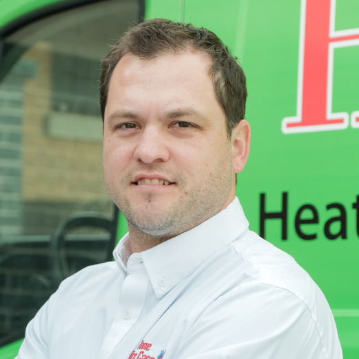 Home Aire Care technician standing by our famous green trucks in a residential neighbourhood. Home Aire Care technician standing by our famous green trucks in a residential neighbourhood.
